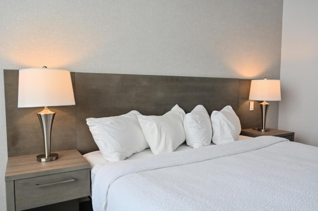Postel nebo postele na pokoji v ubytování Repotel Levis