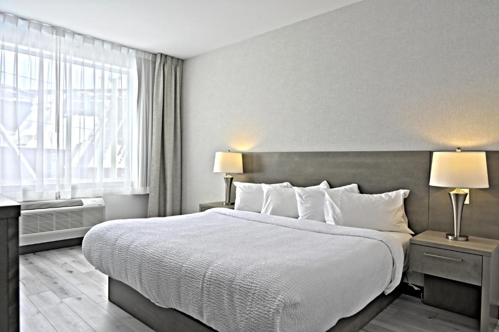 Postel nebo postele na pokoji v ubytování Repotel Levis