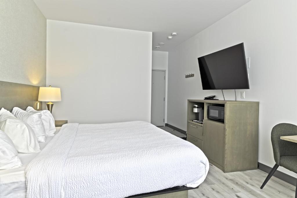 Postel nebo postele na pokoji v ubytování Repotel Levis