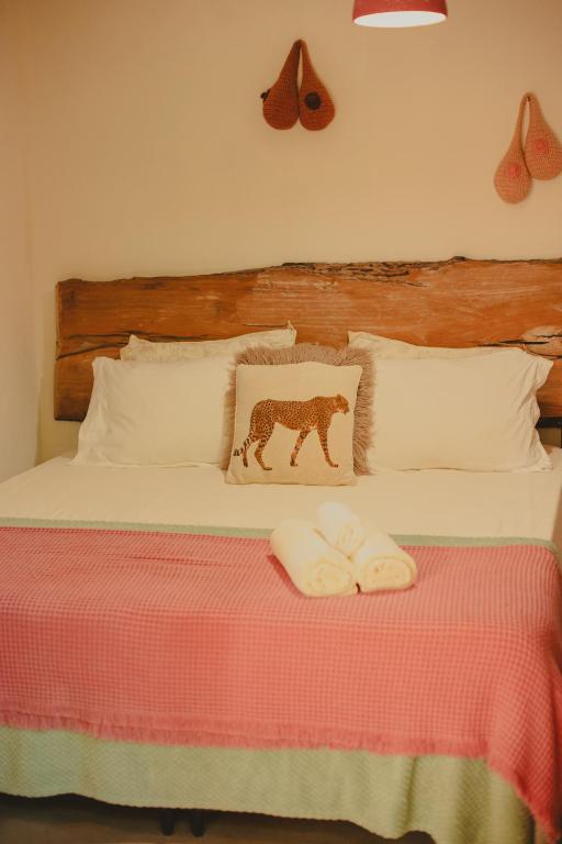 Postel nebo postele na pokoji v ubytování Vulva Caraíva Hostel e Pousada para Mulheres