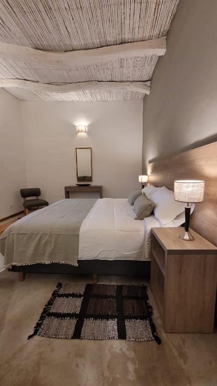 Postel nebo postele na pokoji v ubytování Adobe Hotel Fiambalá