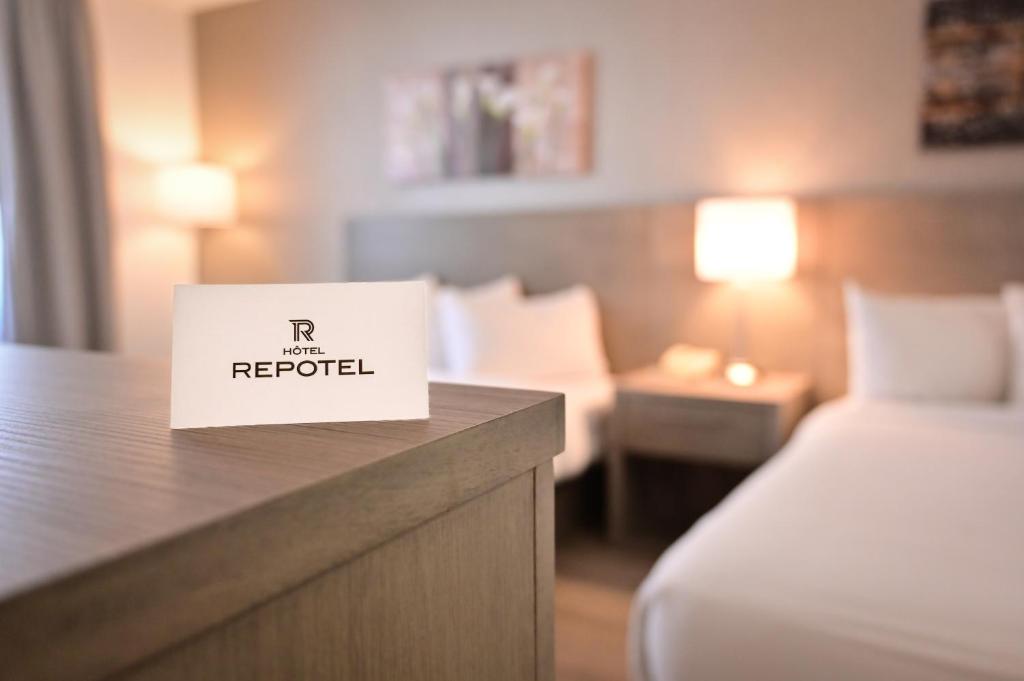 Postel nebo postele na pokoji v ubytování Repotel Levis