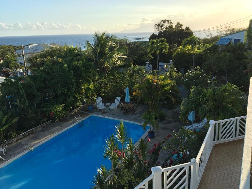 La alberca dentro o cerca de Hotel Cap Sud Caraibes