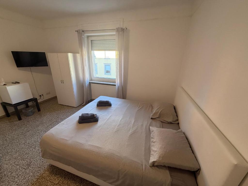 Postel nebo postele na pokoji v ubytování Chambre centre gasperich