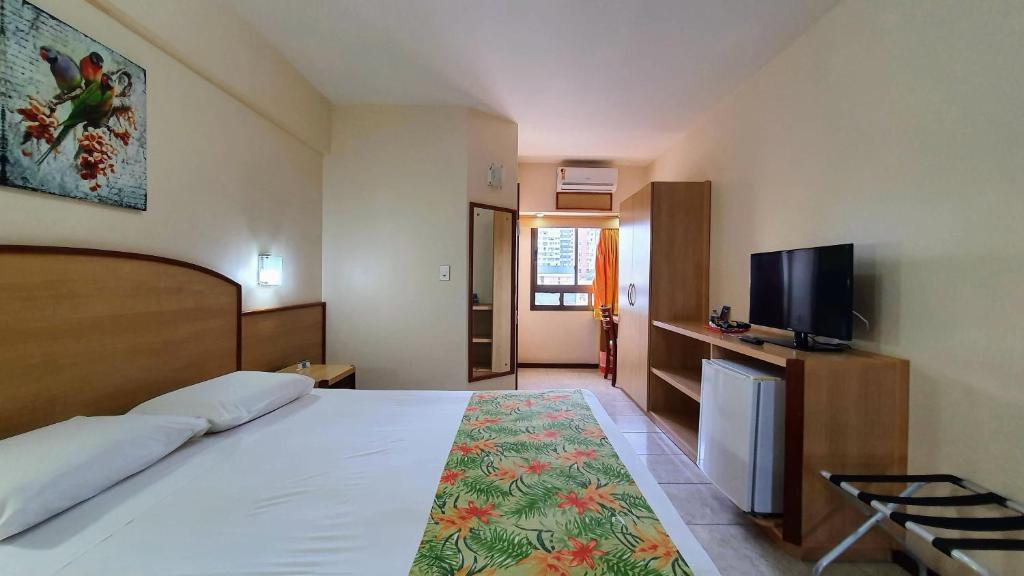 TV a/nebo společenská místnost v ubytování Hotel Verdemar