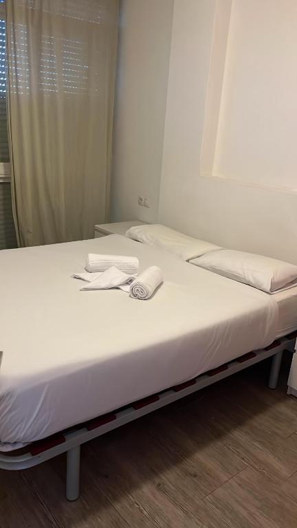 Posteľ alebo postele v izbe v ubytovaní Bonito apartamento cerca del puerto