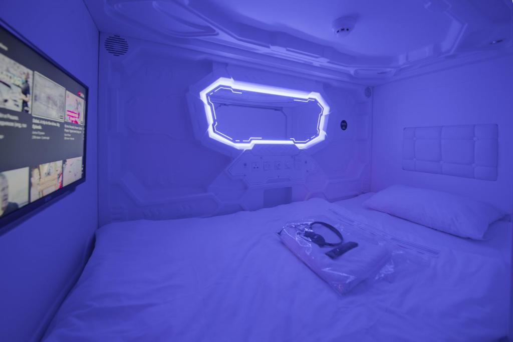Postel nebo postele na pokoji v ubytování MOONOTEL Maidan