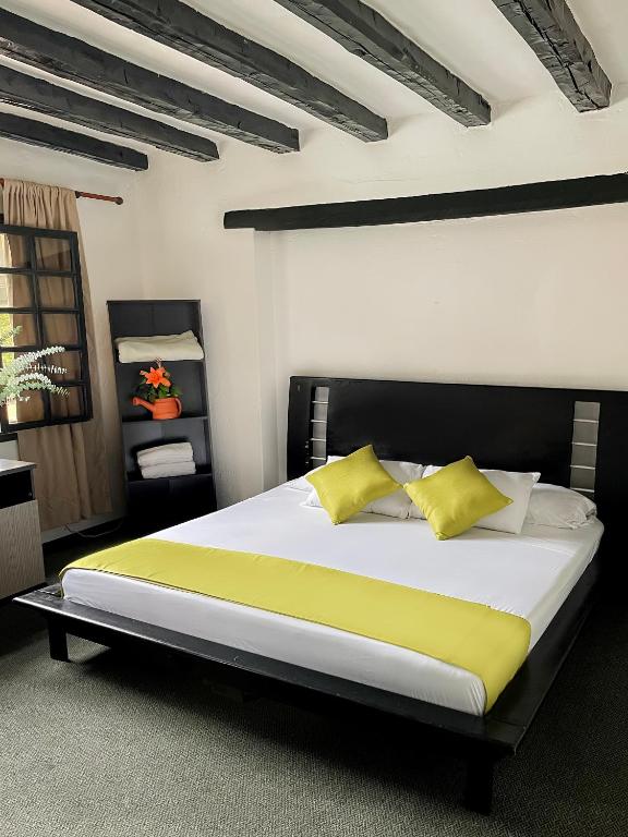 Postel nebo postele na pokoji v ubytování Hotel Premium Real