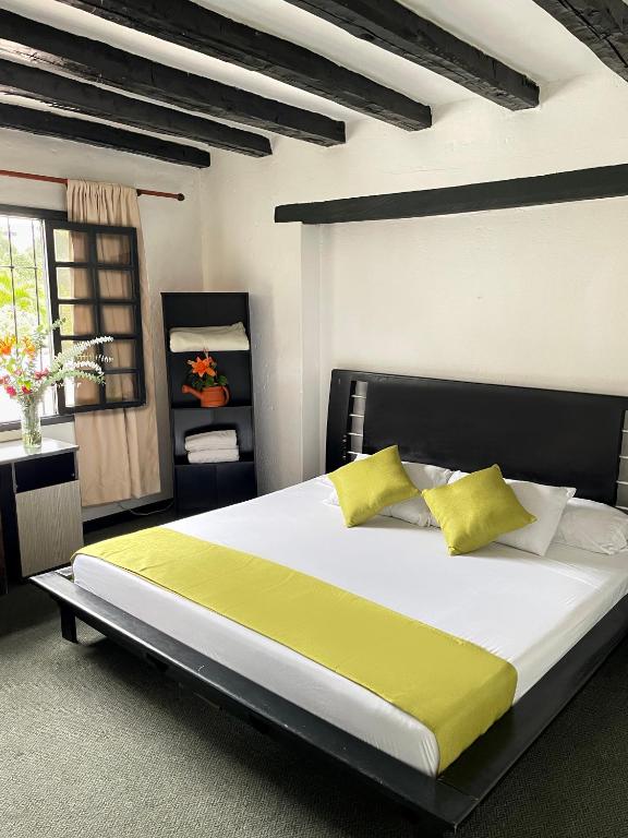 Postel nebo postele na pokoji v ubytování Hotel Premium Real