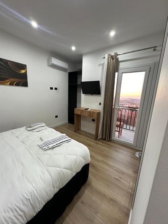 Postel nebo postele na pokoji v ubytování Luz de Sol Rooms