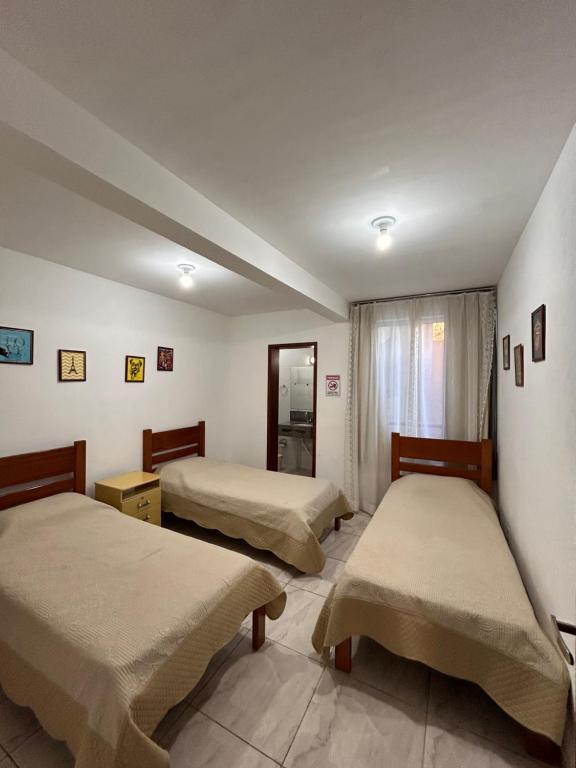 Postel nebo postele na pokoji v ubytování Thiferer Hostel