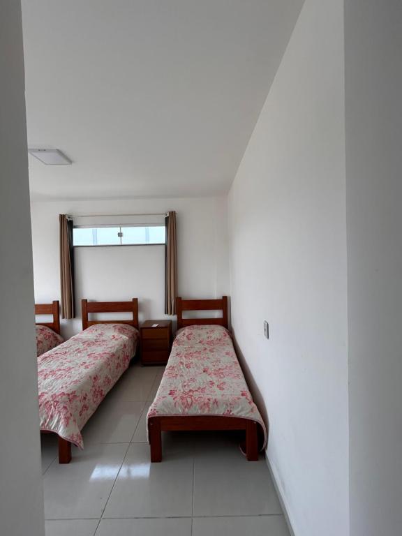 Postel nebo postele na pokoji v ubytování Thiferer Hostel