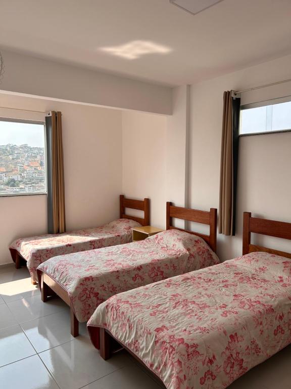 Postel nebo postele na pokoji v ubytování Thiferer Hostel