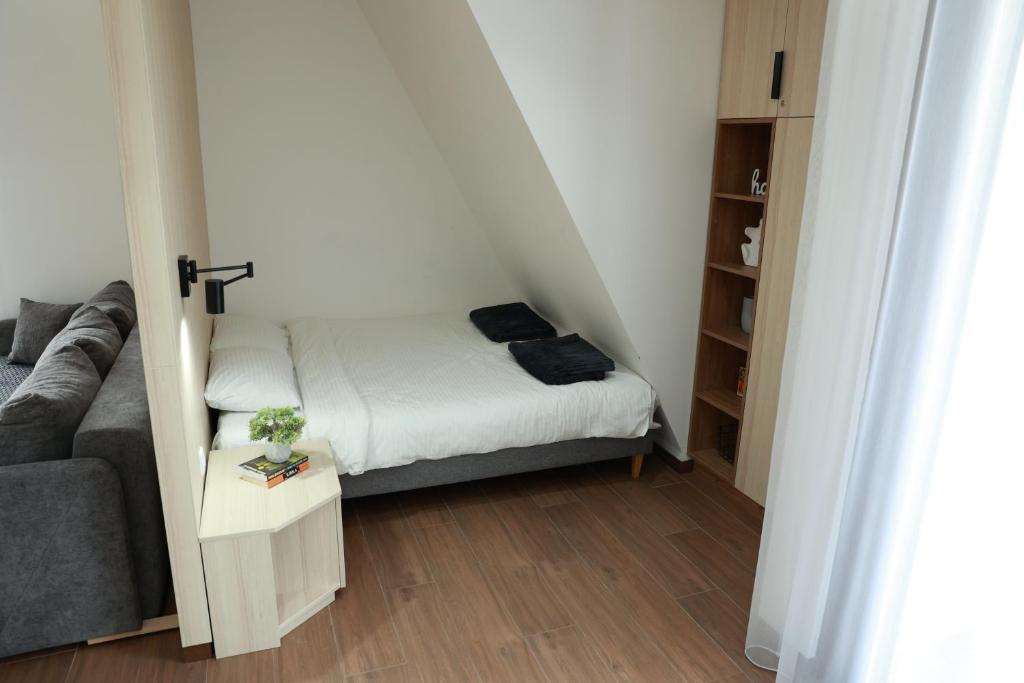 Postel nebo postele na pokoji v ubytování Apartman Borovi 11 Divčibare