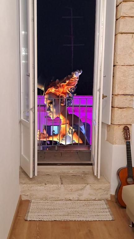 an open door with a view of a room at A Levante in Putignano