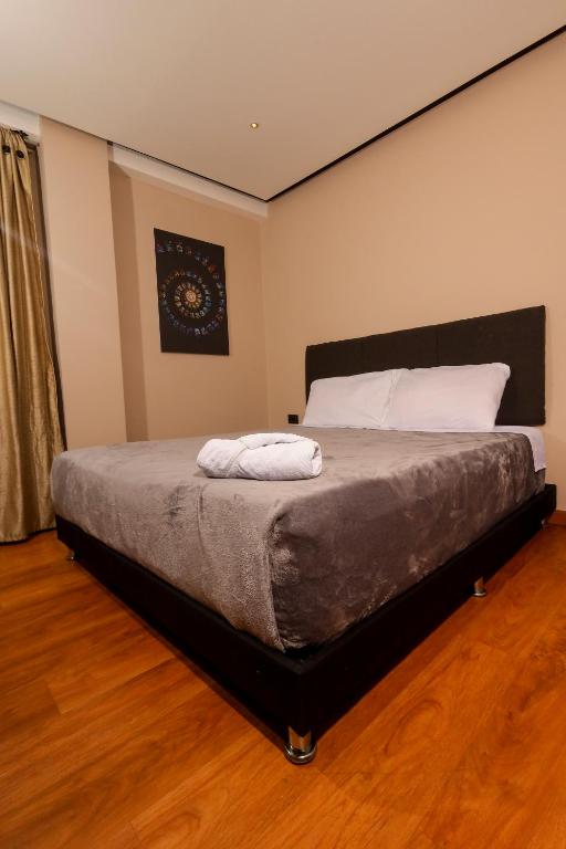 Postel nebo postele na pokoji v ubytování HOTEL HTL