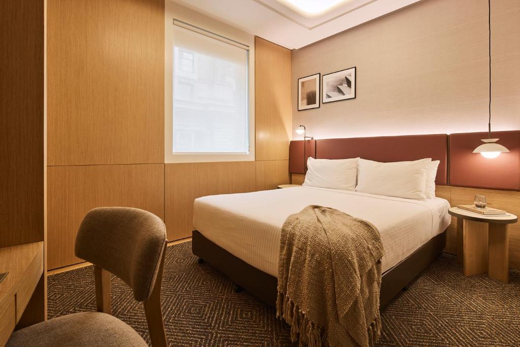 Postel nebo postele na pokoji v ubytování Rydges Australia Square