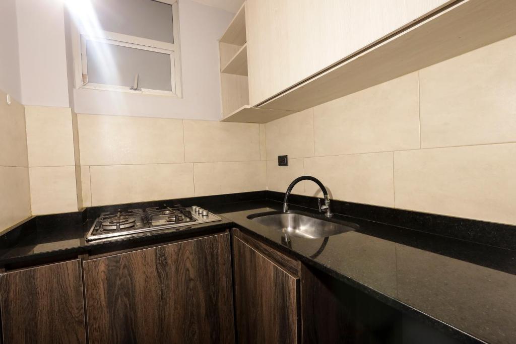 Kuchyň nebo kuchyňský kout v ubytování HOTEL HTL