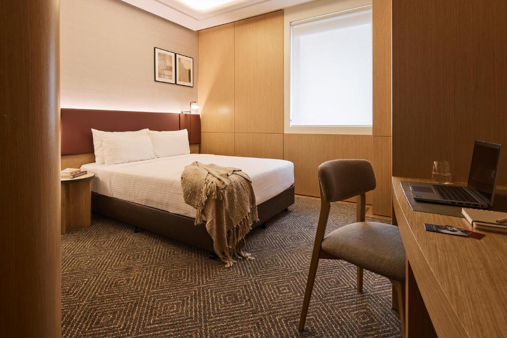 Postel nebo postele na pokoji v ubytování Rydges Australia Square