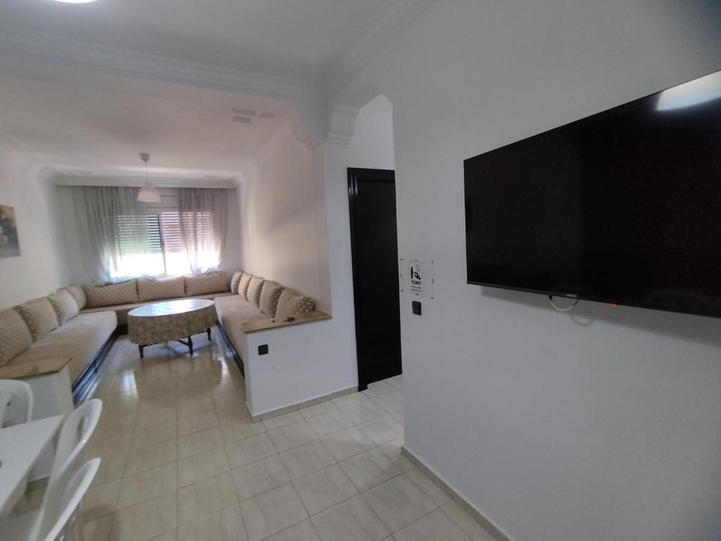 TV a/nebo společenská místnost v ubytování rabatcitycenterresidence
