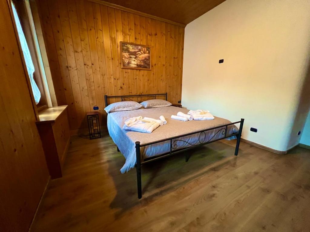 Postel nebo postele na pokoji v ubytování Casa Experience - Venas Di Cadore