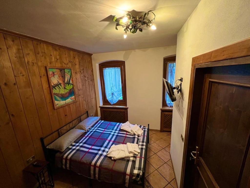 Postel nebo postele na pokoji v ubytování Casa Experience - Venas Di Cadore