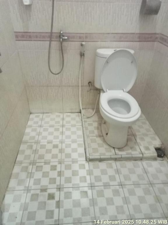 Koupelna v ubytování Hotel Alifa Syariah