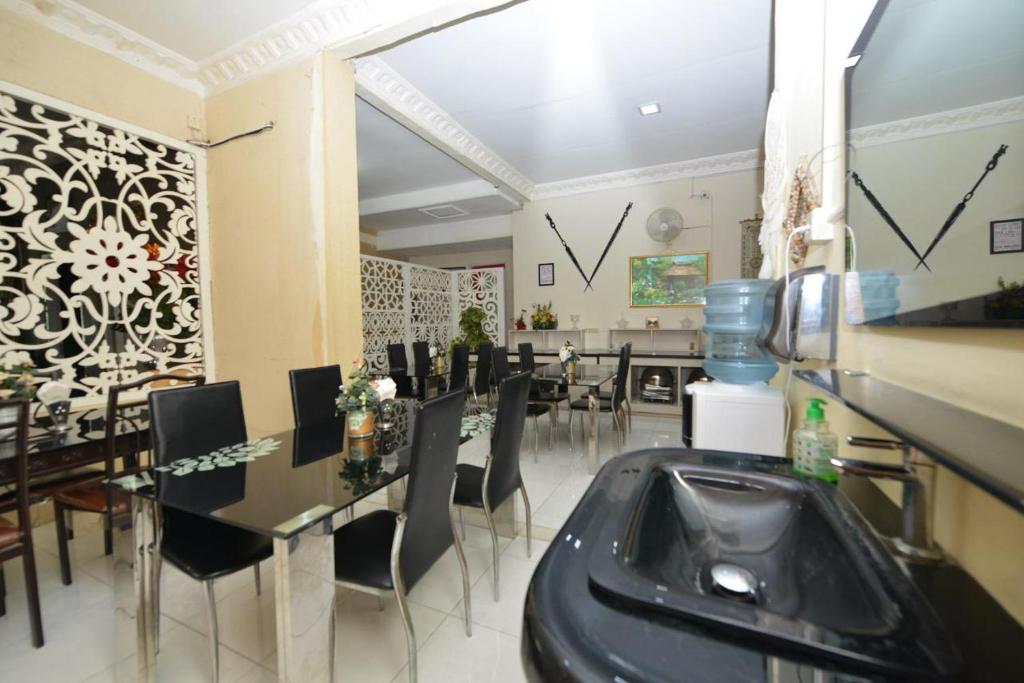 Kuchyň nebo kuchyňský kout v ubytování Hotel Alifa Syariah