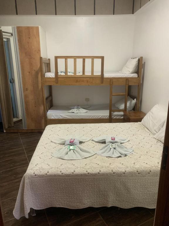 Postel nebo postele na pokoji v ubytování NatuCenter Hospedaje