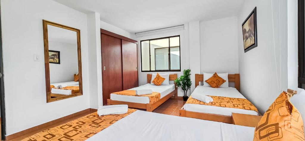 Postel nebo postele na pokoji v ubytování Villa Cataluña en Carmen de Apicalá