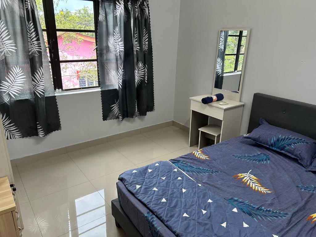 Postel nebo postele na pokoji v ubytování Chengai homestay
