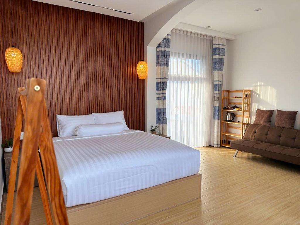 Postel nebo postele na pokoji v ubytování Experience Homestay