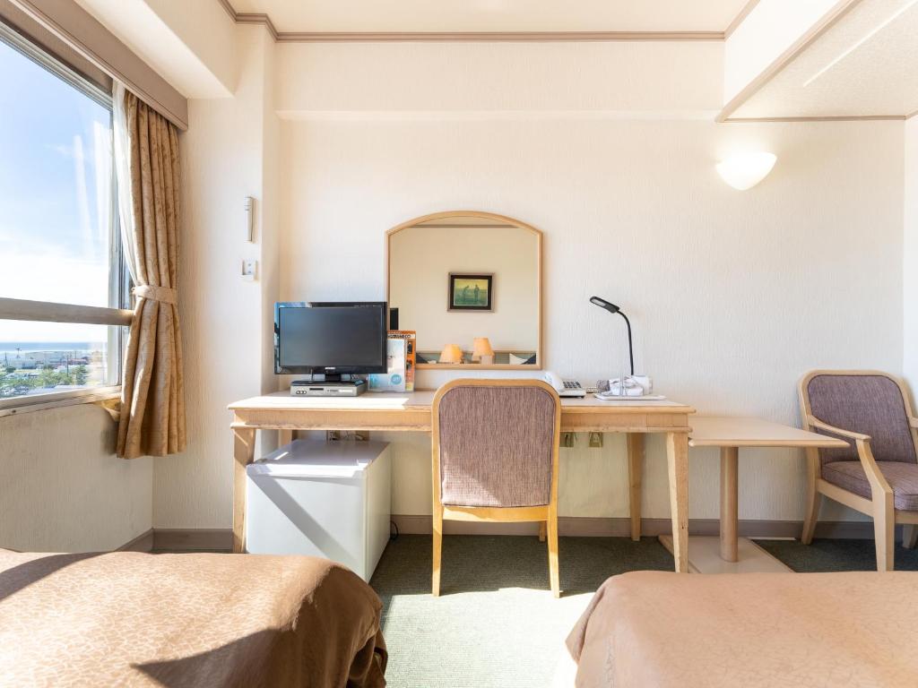 TV a/nebo společenská místnost v ubytování Tabist Hotel Ginga Kisarazu