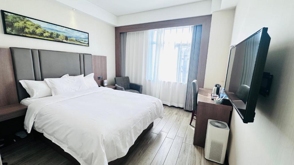 TV a/nebo společenská místnost v ubytování Bestway Hotel Xi'an
