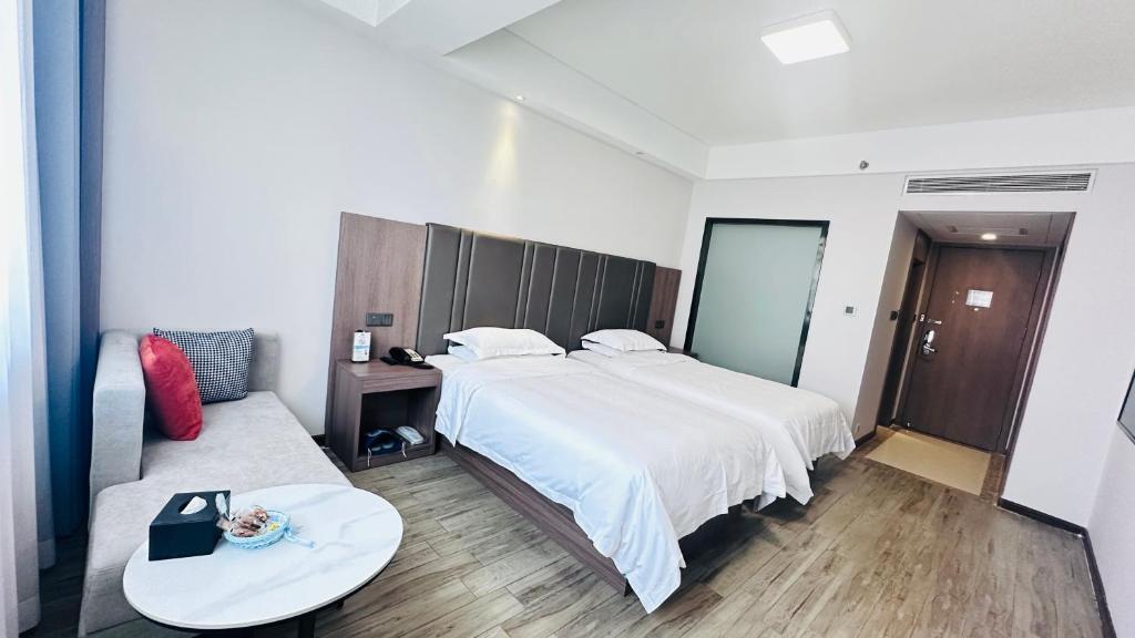 Postel nebo postele na pokoji v ubytování Bestway Hotel Xi'an