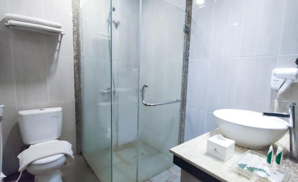 Koupelna v ubytování Puteri Gunung Hotel