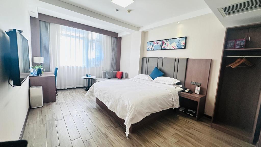 Postel nebo postele na pokoji v ubytování Bestway Hotel Xi'an