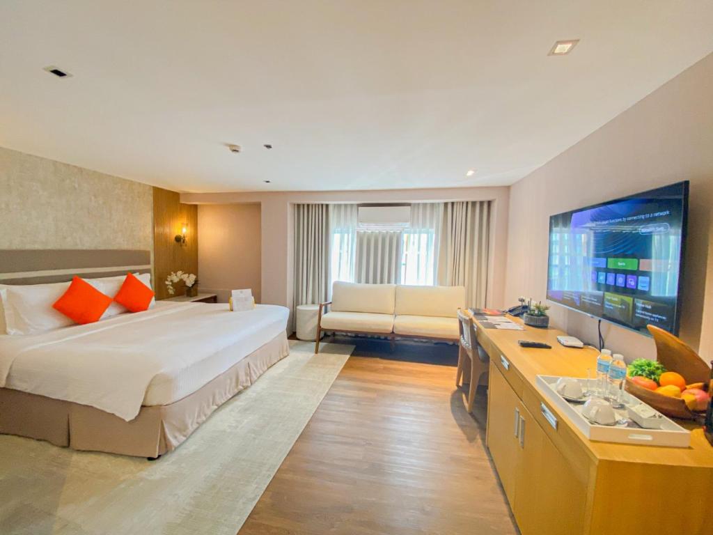 Postel nebo postele na pokoji v ubytování Hotel St. Ellis