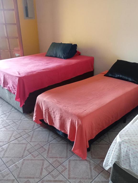 Cama ou camas em um quarto em Quarto Privativo a 10 Min do Aeroporto GRU I