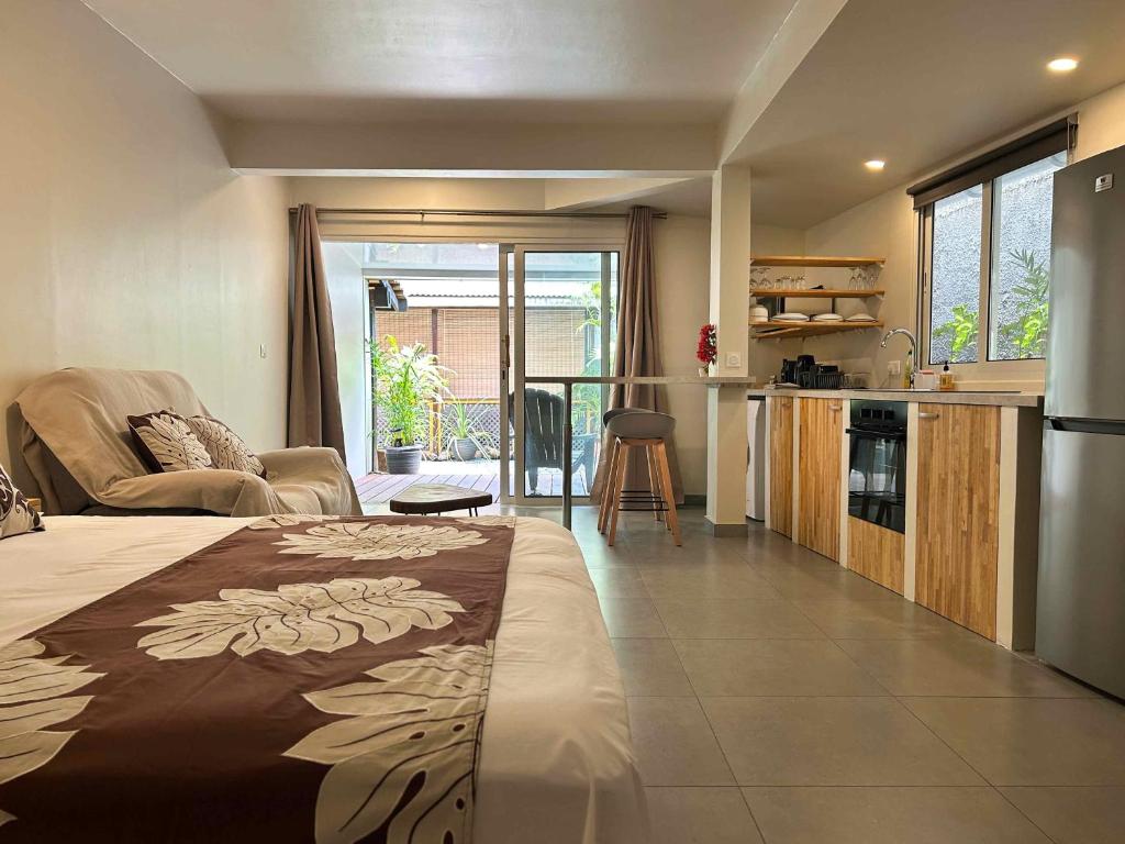 Kuchyň nebo kuchyňský kout v ubytování Lodge Waterfront Tahiti