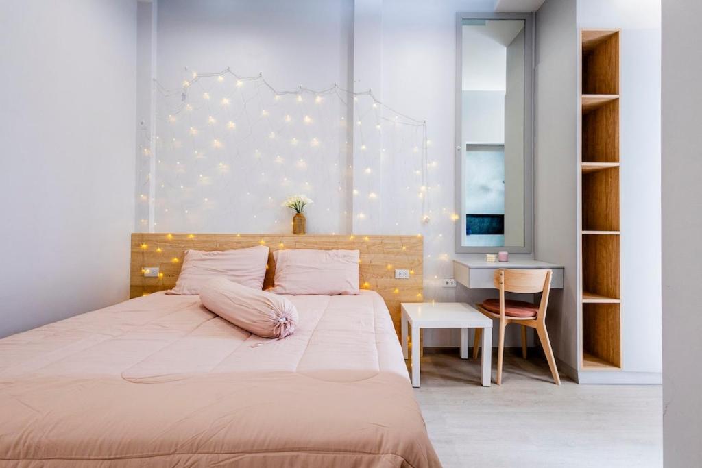 Postel nebo postele na pokoji v ubytování TownHouse7 2BR MonkeyHill