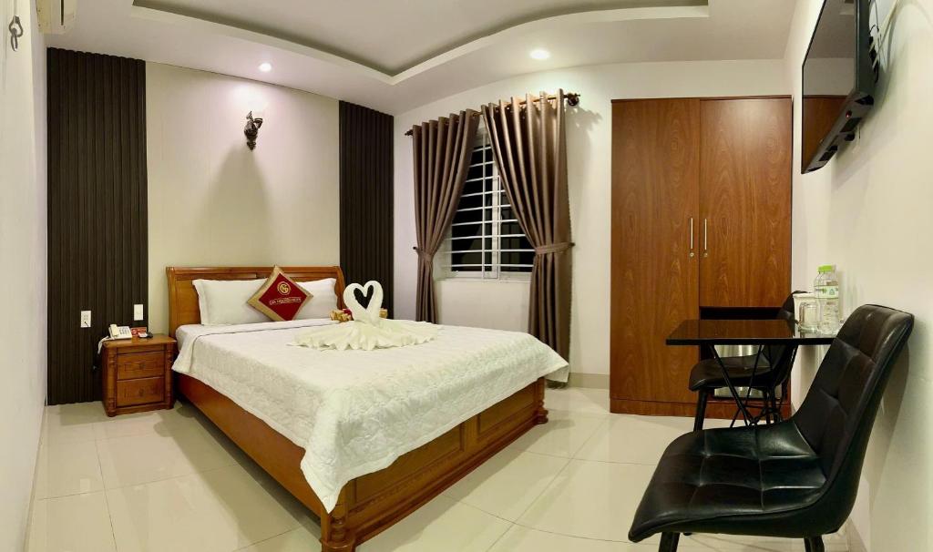 Postel nebo postele na pokoji v ubytování Gia Nguyen Hotel Vung Tau
