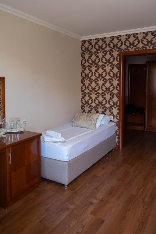 Postelja oz. postelje v sobi nastanitve Hotel Bristol