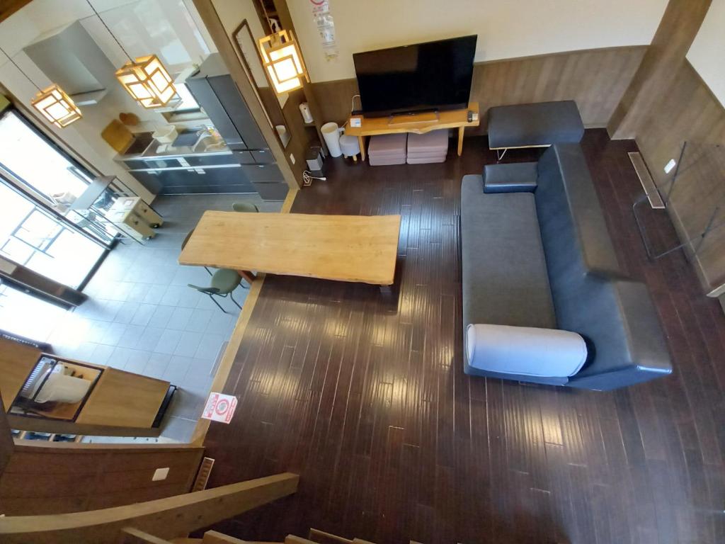 TV a/nebo společenská místnost v ubytování Villa Orange Cabin