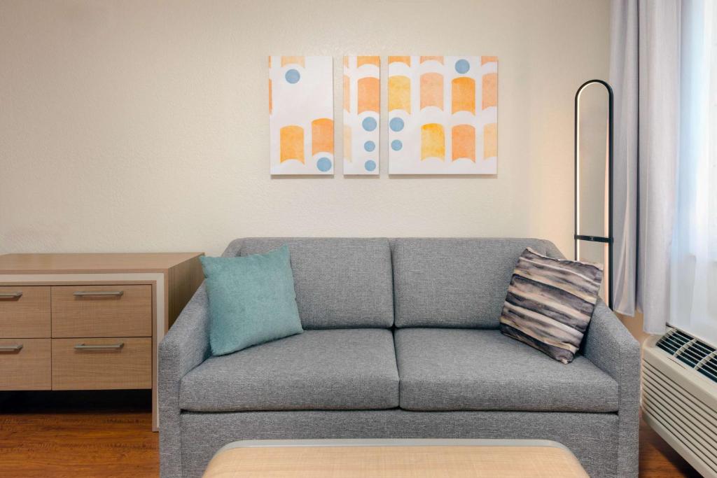 a living room with a couch and a table at Homewood Suites by Hilton Bonita Springs, FL in Bonita Springs