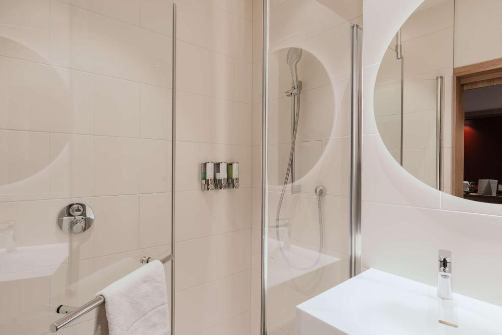 Ванная комната в Hampton By Hilton Vienna City West