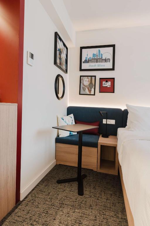 Кровать или кровати в номере Hampton By Hilton Vienna City West