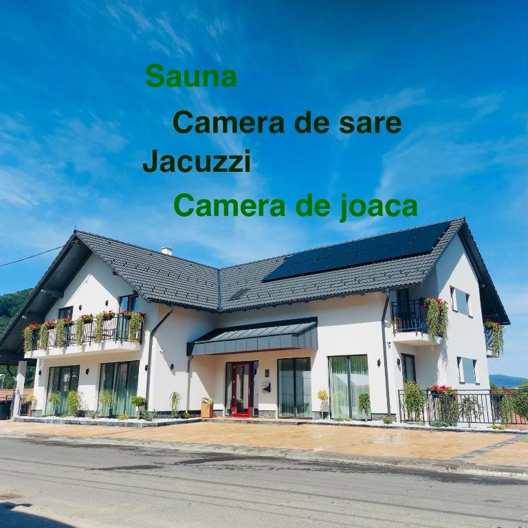 a building with the words sauna camanca de sane jaziraancaanca at Pensiunea Royal Panzió in Praid