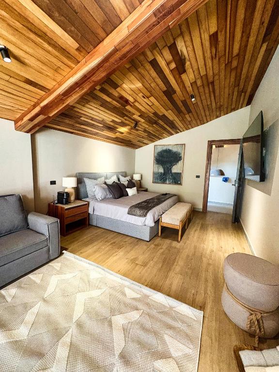 Postel nebo postele na pokoji v ubytování Serenzzo Hotel & Cuisine