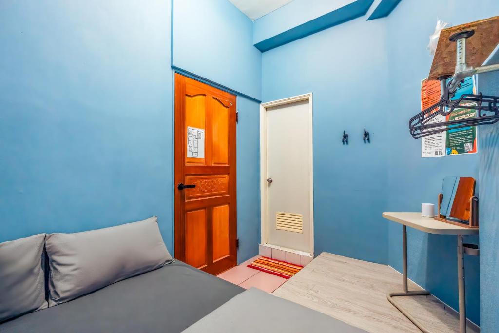 Postel nebo postele na pokoji v ubytování Green Island Ocean Rhythem dive B&B 綠島海韻民宿